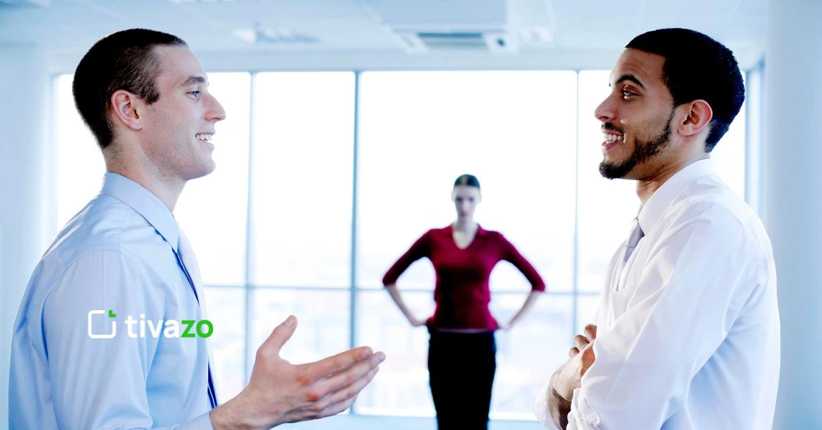 three people talking about Employee Behavior in the workplace