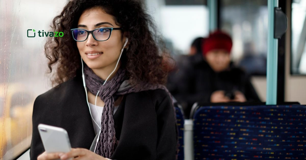 a girl using commute time calculator in train