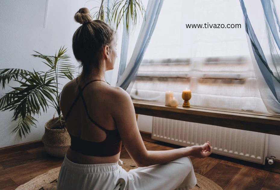 a picture of girl in meditation to overcome productivity guilt